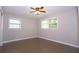 Spacious bedroom with hardwood floors and ceiling fan at 2501 Henderson Mill Ne Rd, Atlanta, GA 30345