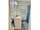 Clean bathroom with white tile, vanity, and shower at 2501 Henderson Mill Ne Rd, Atlanta, GA 30345