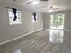 Large living room with hardwood floors and sliding glass doors at 2501 Henderson Mill Ne Rd, Atlanta, GA 30345