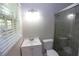 Bathroom with shower and single sink vanity at 2501 Henderson Mill Ne Rd, Atlanta, GA 30345