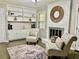 Bright living room with built-in shelving and fireplace at 2501 Henderson Mill Ne Rd, Atlanta, GA 30345