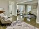 Open concept living area with hardwood floors, neutral decor, and ample natural light at 2501 Henderson Mill Ne Rd, Atlanta, GA 30345