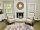 Living room featuring a fireplace and comfortable seating at 2501 Henderson Mill Ne Rd, Atlanta, GA 30345