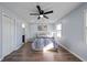 Spacious bedroom with hardwood floors and ceiling fan at 1368 New Hope Rd, Lawrenceville, GA 30045