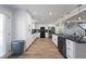 Open concept kitchen with island and stainless steel appliances at 1368 New Hope Rd, Lawrenceville, GA 30045