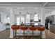 Modern kitchen with dark countertops and bar seating at 1368 New Hope Rd, Lawrenceville, GA 30045