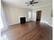 Living room with fireplace and hardwood floors at 5328 Sweetsprings Sw Way, Powder Springs, GA 30127