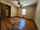 Spacious bedroom with hardwood floors and ample closet space at 25 Bryans Dr, Mcdonough, GA 30252