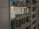 Private balcony with glass railings offering scenic views at 950 W Peachtree Nw St # 1214, Atlanta, GA 30309