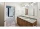 Double vanity bathroom with granite countertop at 950 W Peachtree Nw St # 1214, Atlanta, GA 30309