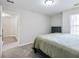 Bedroom with a dresser and green comforter at 2397 Sardis Chase Ct, Buford, GA 30519
