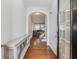 Bright and airy entryway with hardwood floors and a view to the living room and staircase at 2397 Sardis Chase Ct, Buford, GA 30519