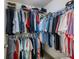 Large walk-in closet with ample hanging space at 2397 Sardis Chase Ct, Buford, GA 30519