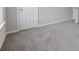 Spacious bedroom with grey carpet and neutral walls at 2397 Sardis Chase Ct, Buford, GA 30519