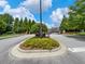 Landscaped entry gate to the community at 2397 Sardis Chase Ct, Buford, GA 30519