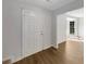 Inviting entryway with wood flooring and views to the living room at 120 Birch Creek Cir, Mcdonough, GA 30253