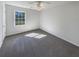 Bright bedroom featuring carpet and a window offering natural light at 120 Birch Creek Cir, Mcdonough, GA 30253