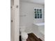 Clean bathroom with a toilet, shower, and built-in bathtub at 120 Birch Creek Cir, Mcdonough, GA 30253