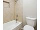 Updated bathroom with a shower/tub combo at 5271 Kelleys Mill Cir, Stone Mountain, GA 30088
