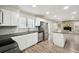 Modern kitchen with stainless steel appliances and granite counters at 5271 Kelleys Mill Cir, Stone Mountain, GA 30088