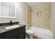 Clean bathroom, featuring a tub and granite countertop at 5271 Kelleys Mill Cir, Stone Mountain, GA 30088