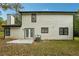 House exterior showcasing a spacious backyard at 5271 Kelleys Mill Cir, Stone Mountain, GA 30088