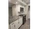 Modern kitchen with granite countertops and stainless steel appliances at 1015 Dunbar Dr, Atlanta, GA 30338