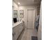 Modern bathroom with white cabinets and a walk-in shower at 1702 Villageside Ct, Lawrenceville, GA 30043