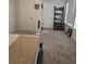 Spacious bedroom with a bed and plenty of floor space at 1702 Villageside Ct, Lawrenceville, GA 30043