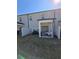 Covered patio with seating area, perfect for outdoor relaxation at 1702 Villageside Ct, Lawrenceville, GA 30043