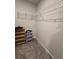 Large walk-in closet with wire shelving and carpeted floor at 1702 Villageside Ct, Lawrenceville, GA 30043