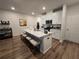 Modern kitchen with white cabinets and a large island at 1702 Villageside Ct, Lawrenceville, GA 30043