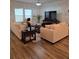 Living room with two sofas and a large TV at 1702 Villageside Ct, Lawrenceville, GA 30043