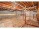 Unfinished basement with storage area and wire partitions at 175 Carriage Gate Dr, Sharpsburg, GA 30277