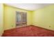 Bedroom with yellow walls and brown carpet at 175 Carriage Gate Dr, Sharpsburg, GA 30277