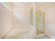 Bathroom with a shower and a jetted tub at 175 Carriage Gate Dr, Sharpsburg, GA 30277