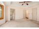 Main bedroom with multiple closets and carpet flooring at 175 Carriage Gate Dr, Sharpsburg, GA 30277