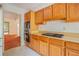 Kitchen features stainless steel appliances and oak cabinets at 175 Carriage Gate Dr, Sharpsburg, GA 30277