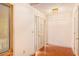 Simple entryway with wood floors and a door to the living area at 175 Carriage Gate Dr, Sharpsburg, GA 30277