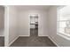 Dining area with view into updated kitchen at 1871 S Columbia Pl, Decatur, GA 30032