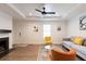 Living room featuring hardwood floors and a cozy fireplace at 3198 Oakdale Rd, Atlanta, GA 30354