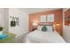 Cozy bedroom with a queen-size bed and accent wall, creating a calming space at 584 Silver Moon Dr, Loganville, GA 30052