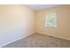 Well-lit bedroom featuring neutral walls and carpet flooring at 2465 Timberly Se Dr, Marietta, GA 30060