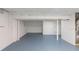 Unfinished basement area with light gray painted floor at 2465 Timberly Se Dr, Marietta, GA 30060