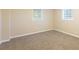 Spacious bedroom with neutral walls and carpet flooring at 2465 Timberly Se Dr, Marietta, GA 30060