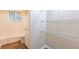 Bathroom with a bathtub, toilet, vanity, and wire shelving at 2465 Timberly Se Dr, Marietta, GA 30060