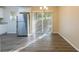 Spacious dining area with wood-look floors and access to patio at 2465 Timberly Se Dr, Marietta, GA 30060