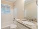 Clean bathroom with granite countertop vanity and a bathtub at 2465 Timberly Se Dr, Marietta, GA 30060