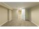 Finished basement room with neutral walls and carpet flooring at 2465 Timberly Se Dr, Marietta, GA 30060