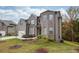Two-story house with brick and siding, offering curb appeal at 4203 Shandi Cv, Hoschton, GA 30548